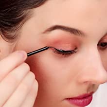  Place the magnetic lashes on your eyes with applicator and done 